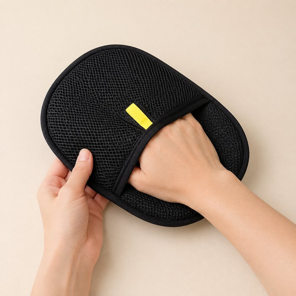 Putting on the reusable Zevfura grooming glove